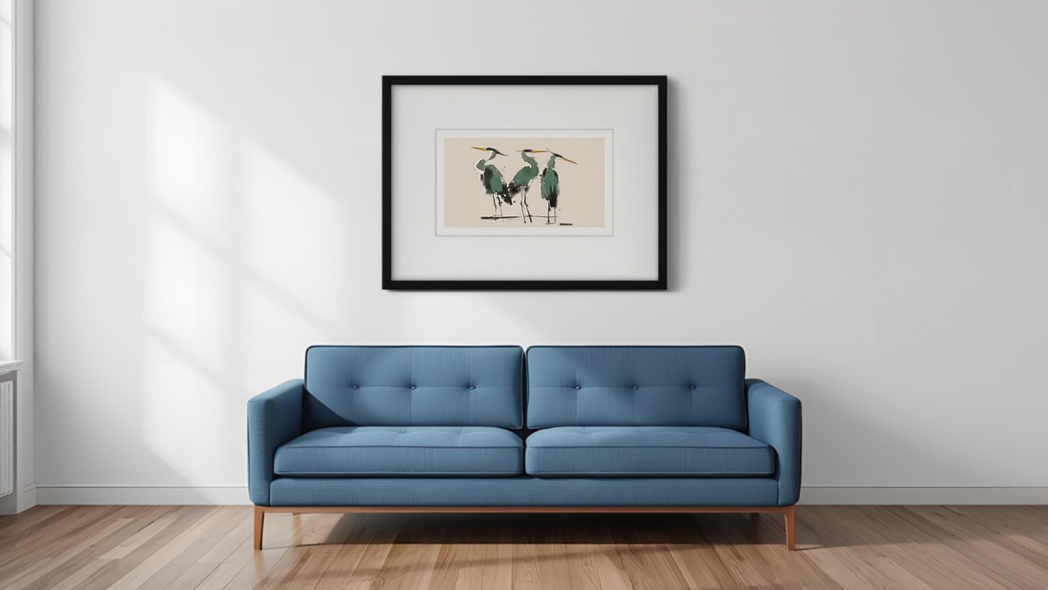 Framed photo hangs above sofa in a modern living room with wooden flooring.