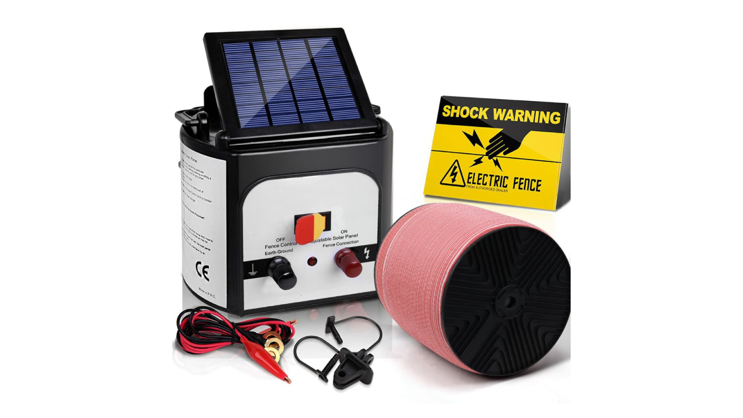 Solar-powered electric fence kit with control box, warning sign, wire spool, and connectors