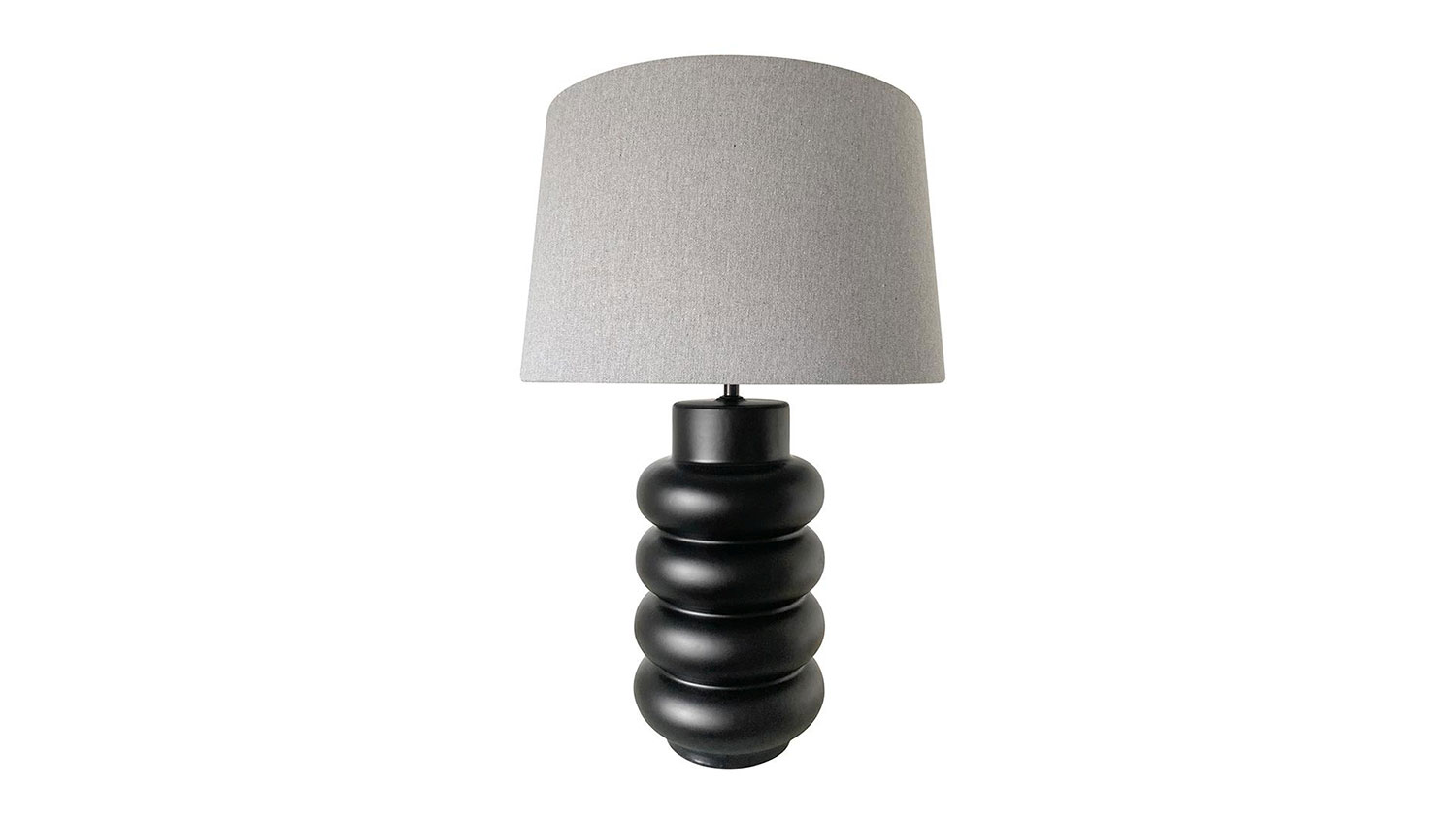 Cannes 59cm Black Ceramic Table Lamp, bold with modern elegance, casting a warm inviting glow.