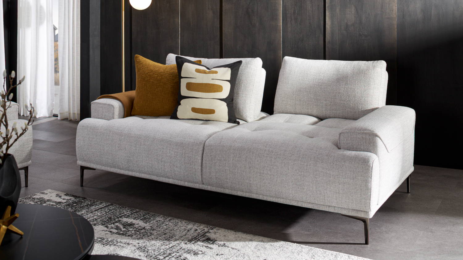 A view of the fabric sofa in a modern living room