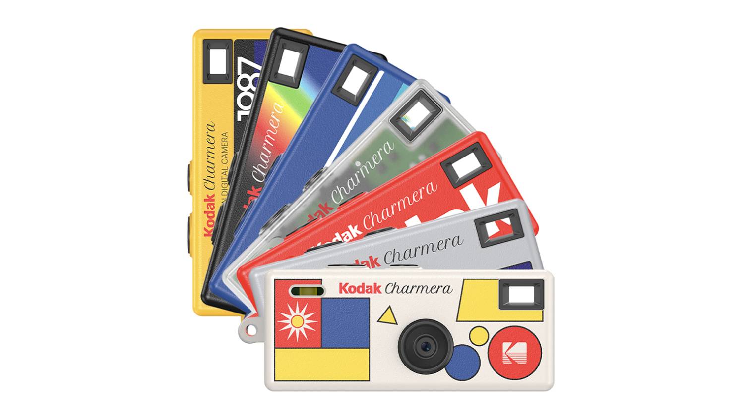 A fan arrangement of seven Kodak Charmera keychain digital cameras in assorted colours and designs