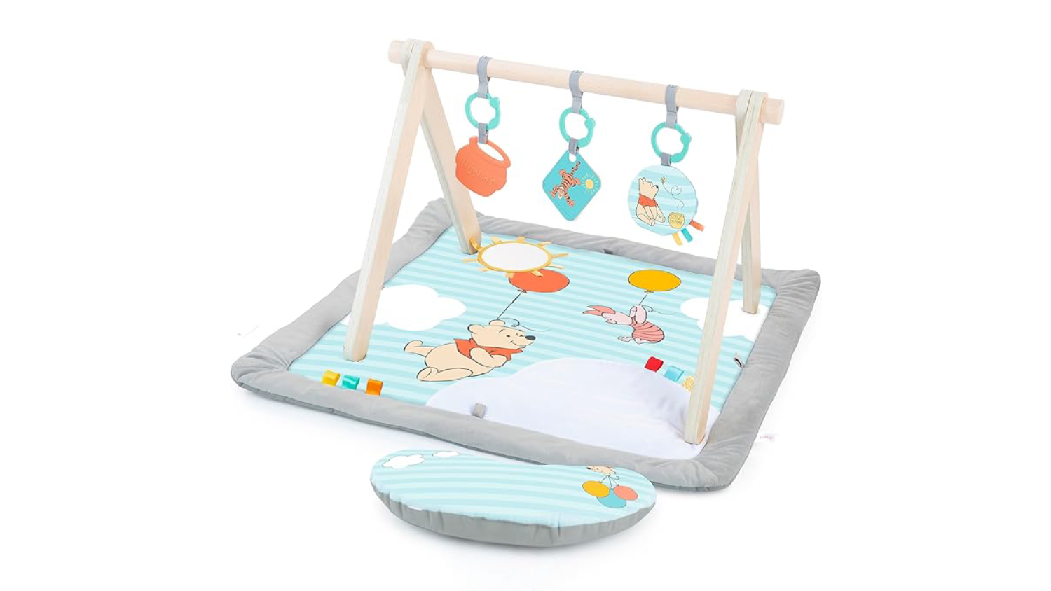 Winnie the Pooh baby activity gym with wooden toy bar, hanging toys, and padded mat