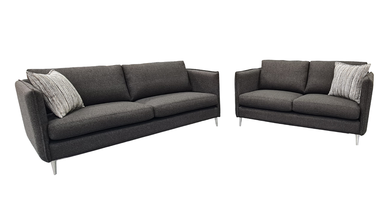 Two-piece living room set featuring a dark gray sofa and loveseat with metal legs