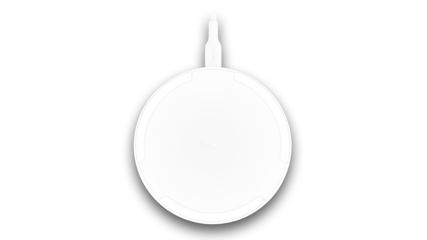 A Belkin BoostCharge 15W Wireless Charging Pad with Qi in vibrant white