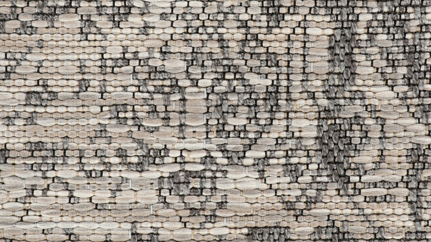 Horizontal close-up focusing on the textured weave and detailed design in beige tones