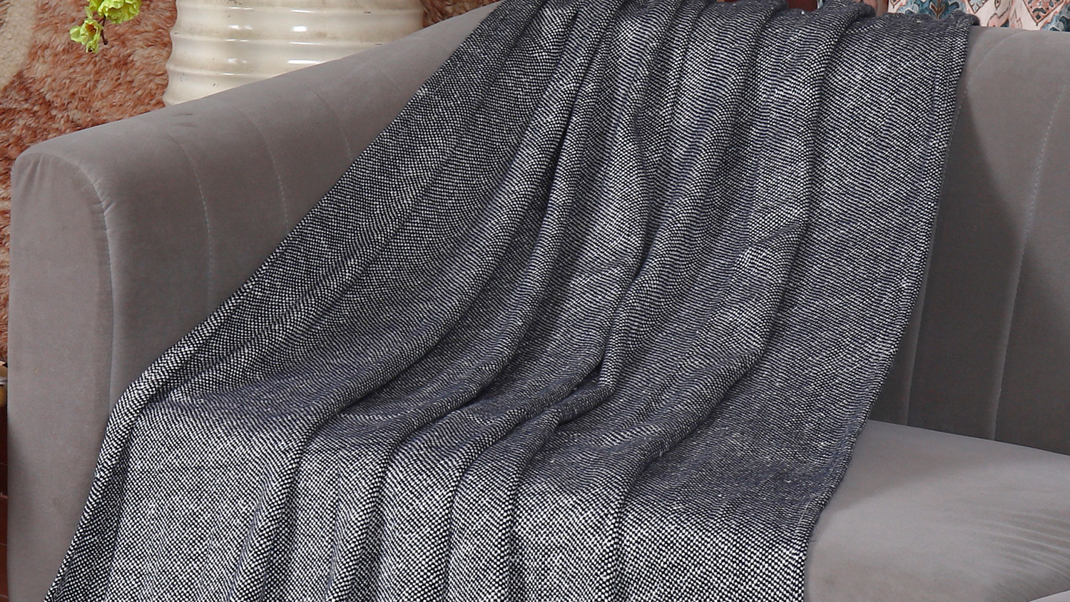 Denali Throw group shot showing Navy, Coffee and Dark Green throws stacked.