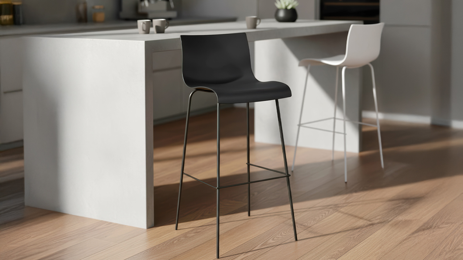 Black Levy Bar Stool with a smooth, curved seat and low backrest, supported by four slim metal legs with a footrest