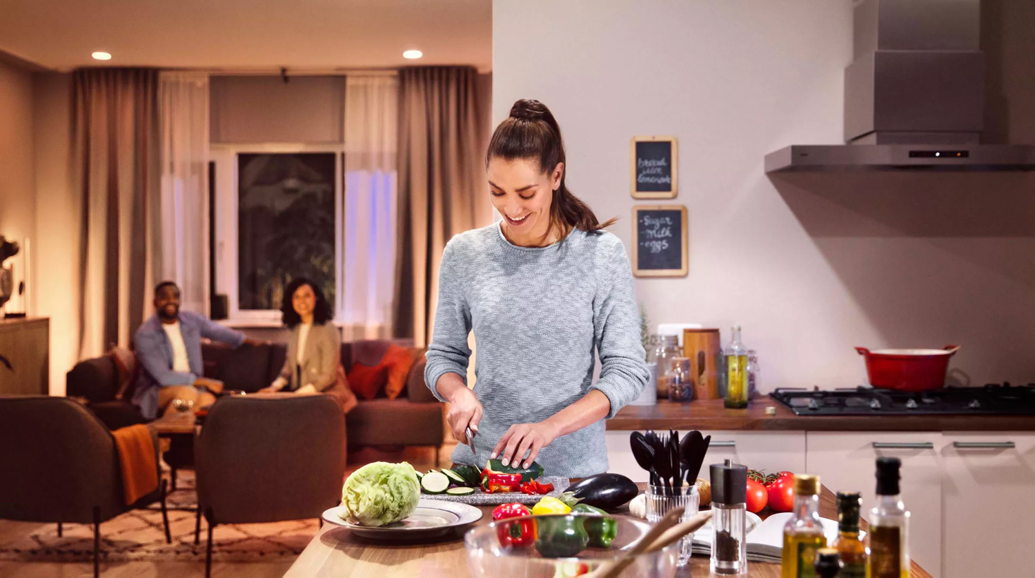 Kitchen with Philips Hue smart lighting while preparing fresh vegetables