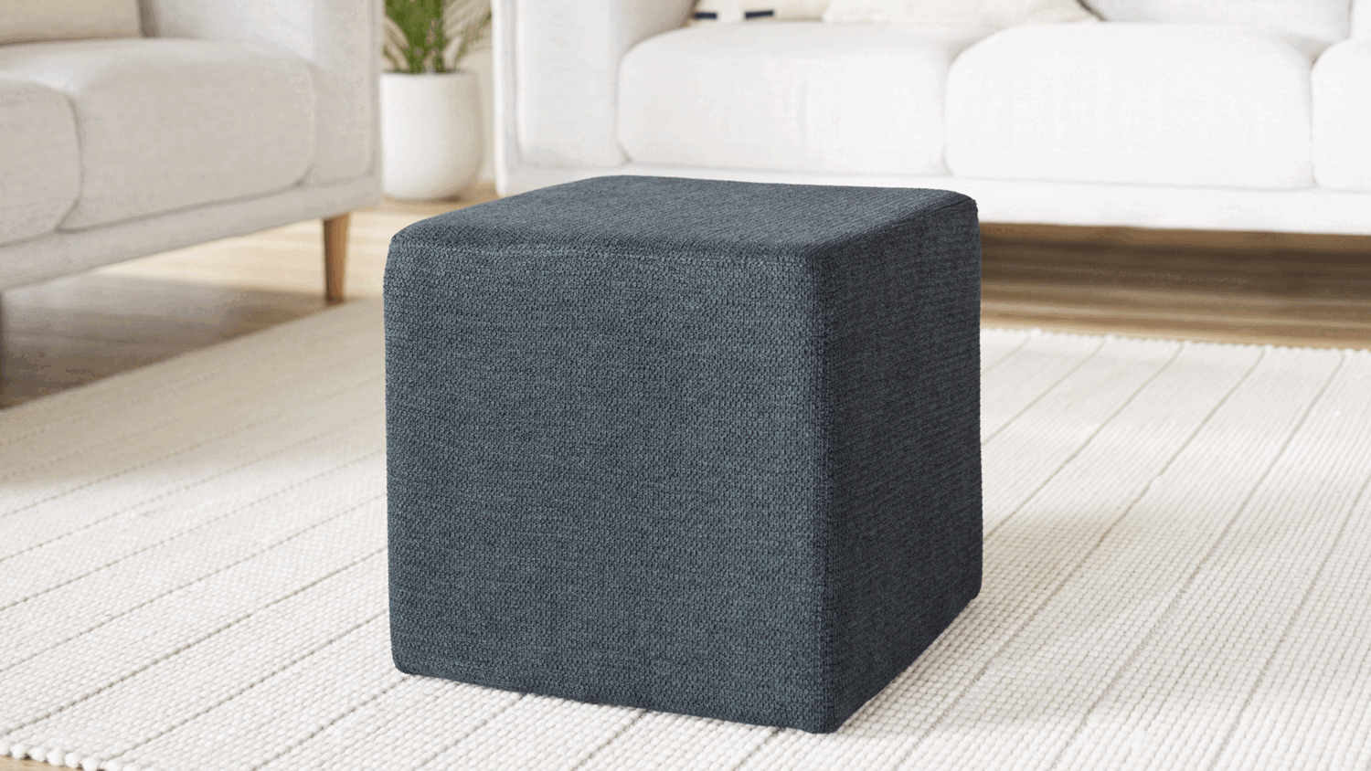 Polar Square Fabric Foot Stool with a simple cube shape and smooth, upholstered finish