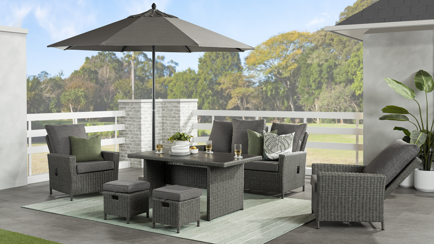 Five-piece outdoor dining suite featuring a sofa, two single armchairs, table, and two small footstools