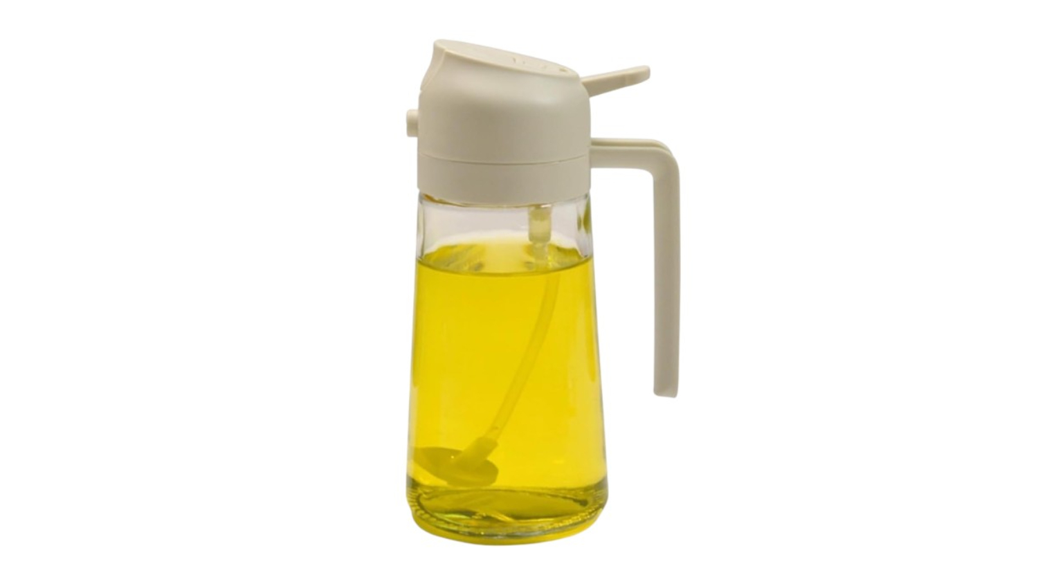 Clear glass oil dispenser with white lid and handle, filled with yellow cooking oil