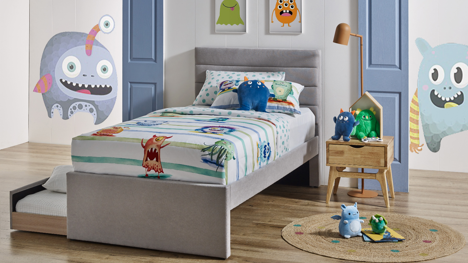 Potter King Single Upholstered Bed Frame with a panel headboard and the trundle fully pulled out