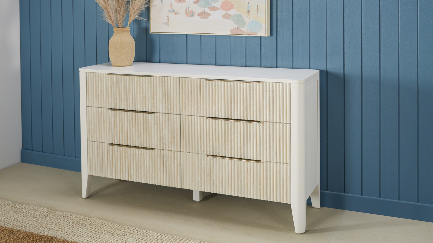 Haiti 6 Drawer Lowboy with pampas vase below beach art