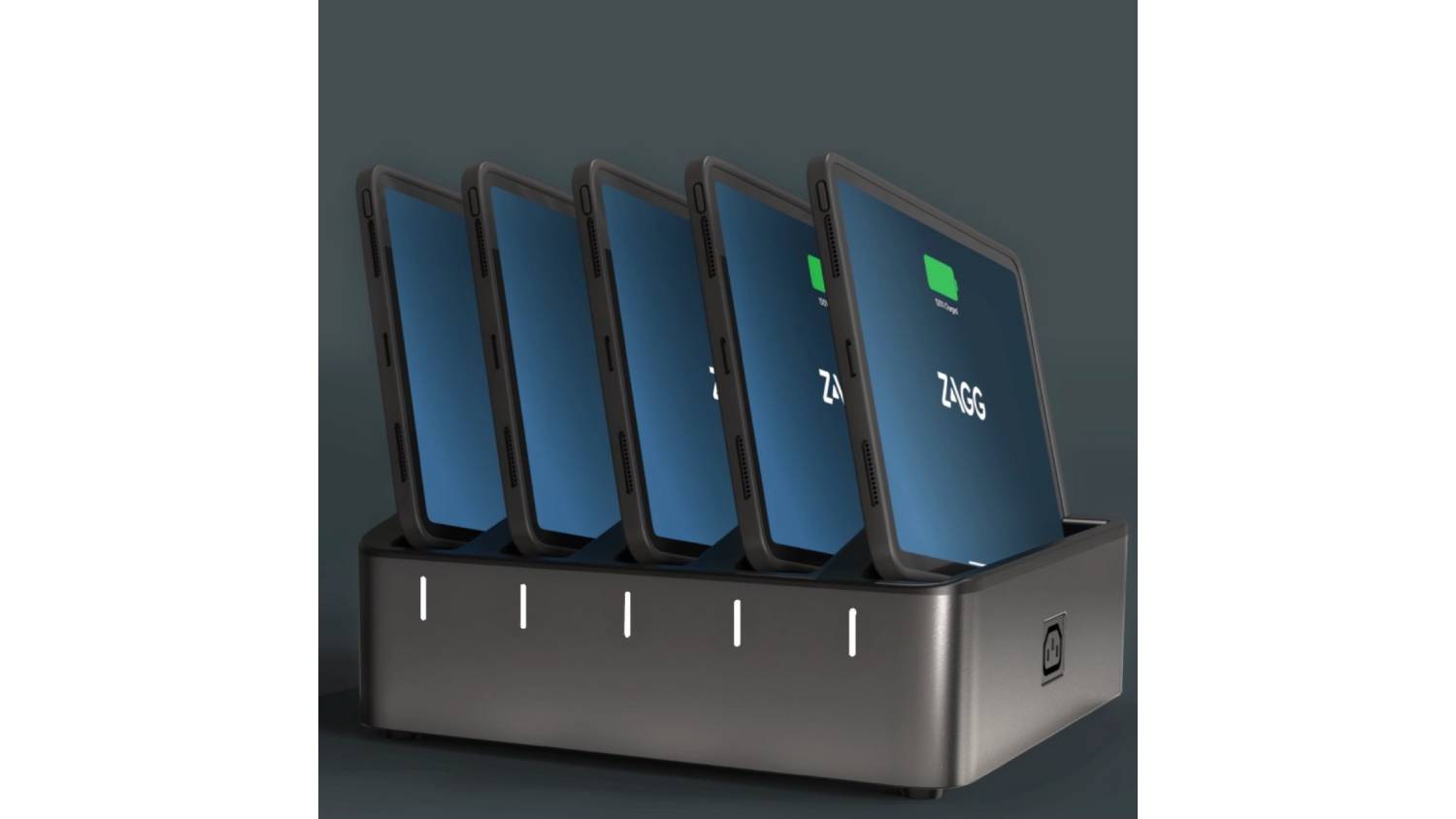 Black Zagg ChargeStation Pro Charging Base holding five iPads with indicator lights and a power port on the side