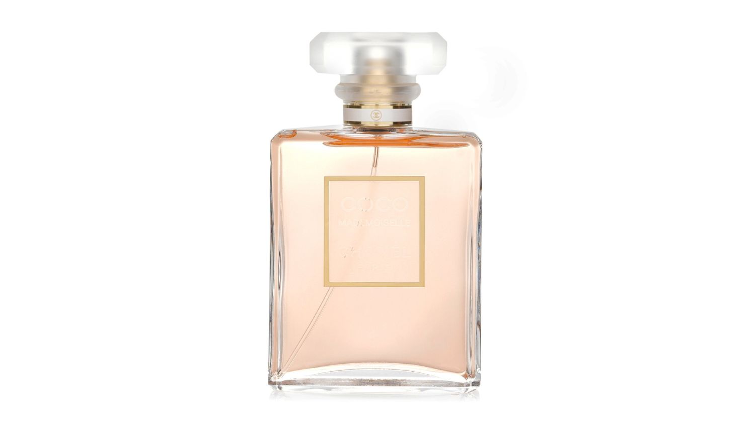 Clear glass bottle of Chanel Coco Mademoiselle Eau de Parfum with pale pink liquid and frosted cap