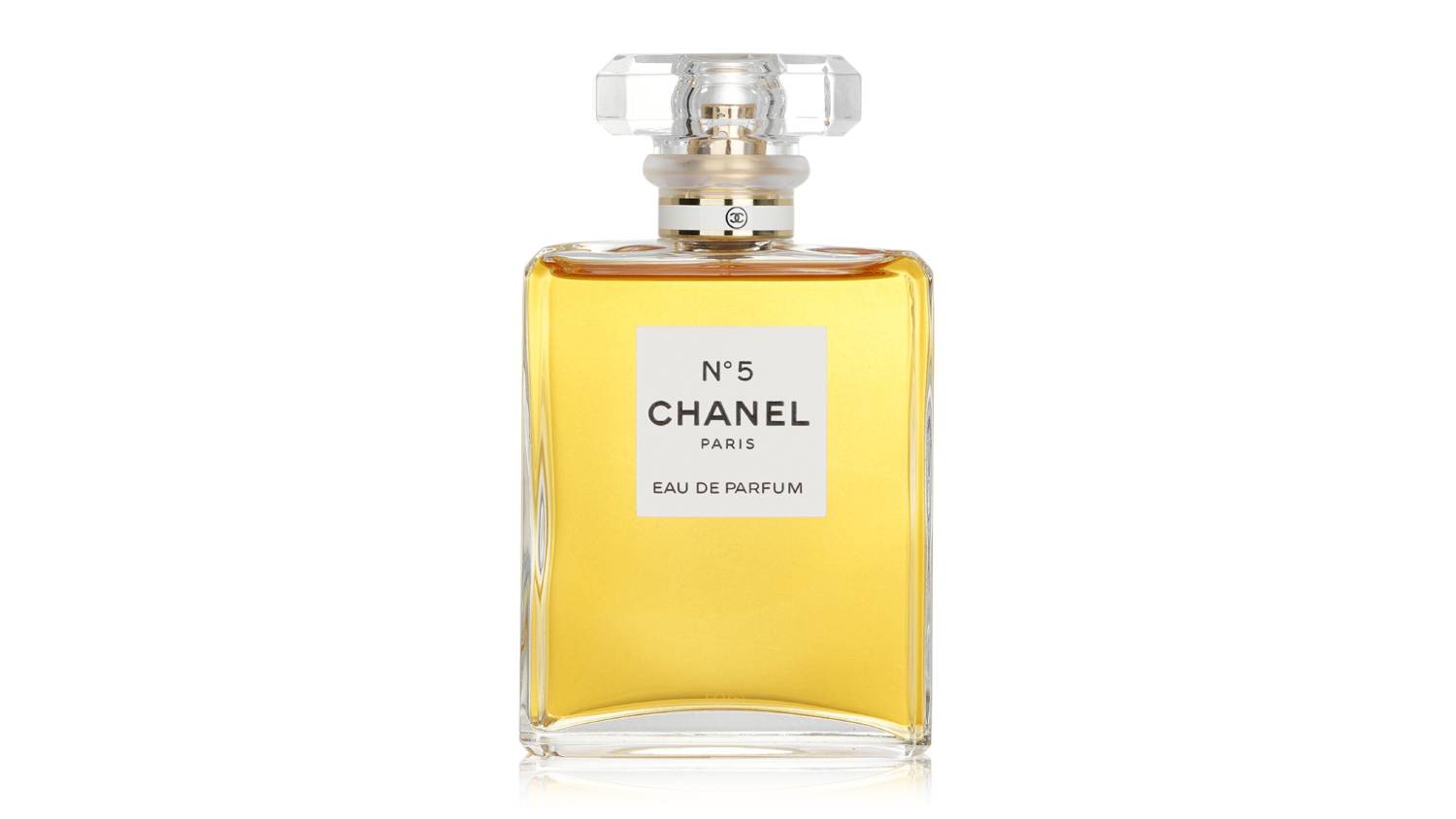 Front view of the Chanel No.5 Eau De Parfum 100ml bottle, showing its glass design and golden fragrance liquid