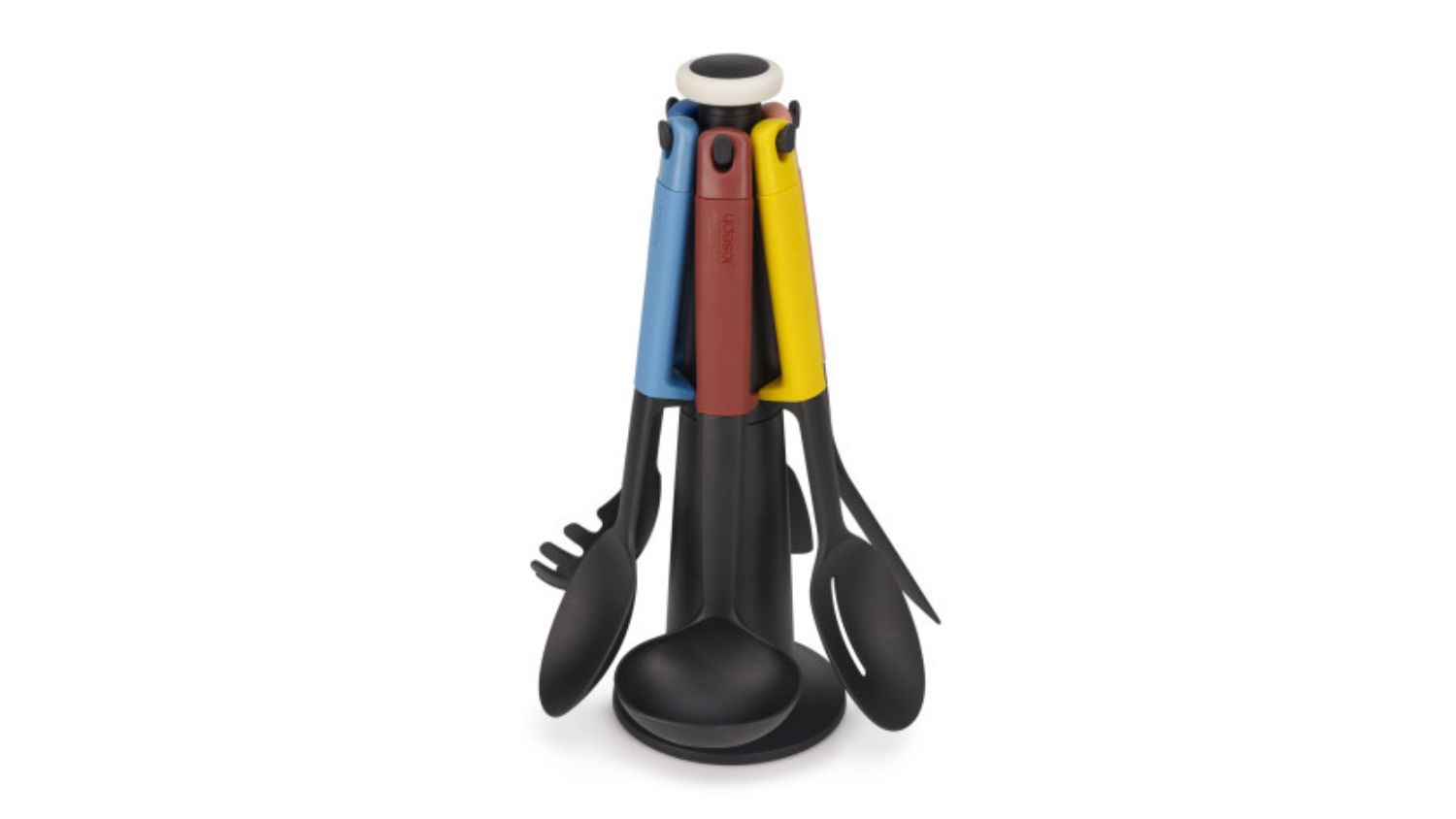 Six colourful kitchen utensils with black heads on a rotating black stand