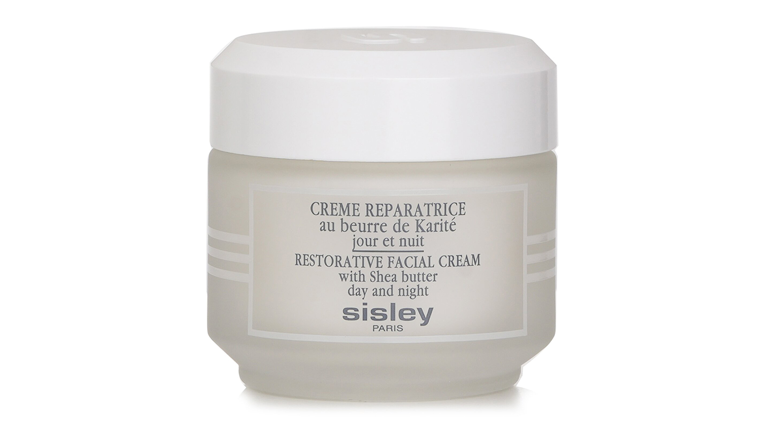 Front view of Sisley Restorative Facial Cream jar with shea butter in a frosted glass container