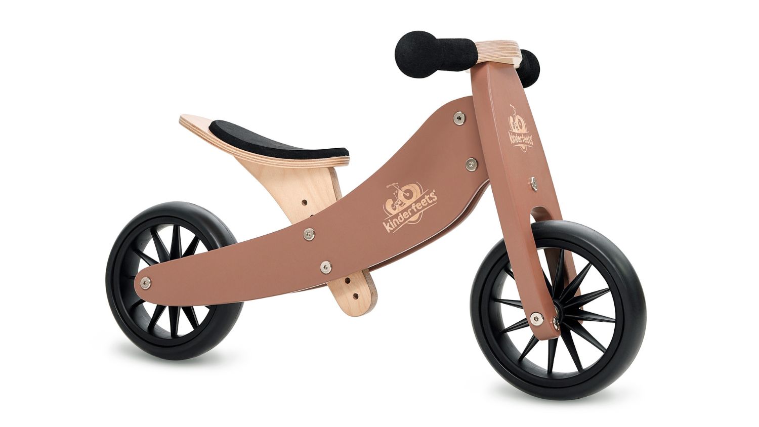 Kinderfeets Tiny Tot wooden balance bike with black wheels and a padded seat