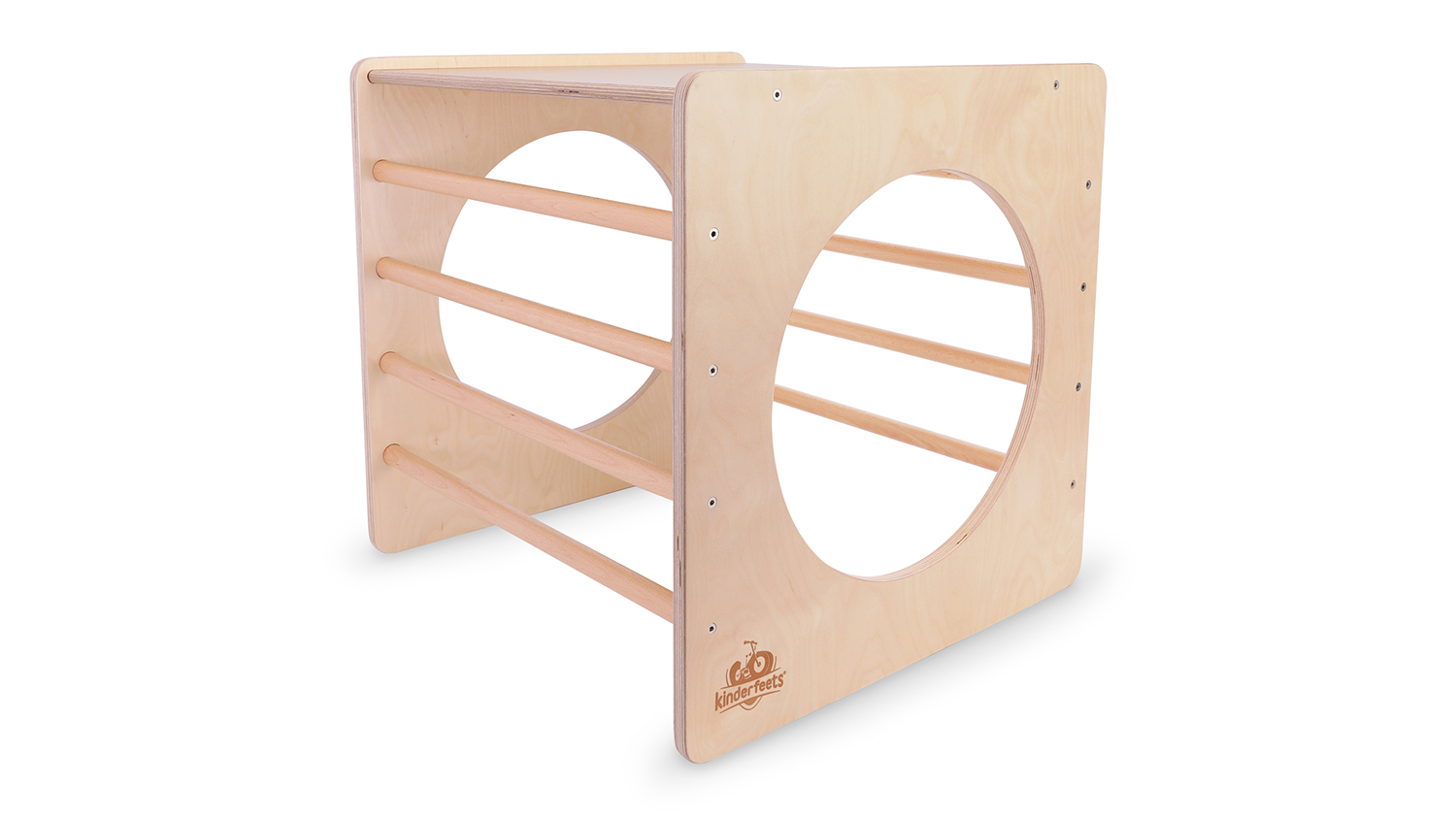 A Kinderfeets Pikler wooden play cube with circular cutouts and climbing rungs