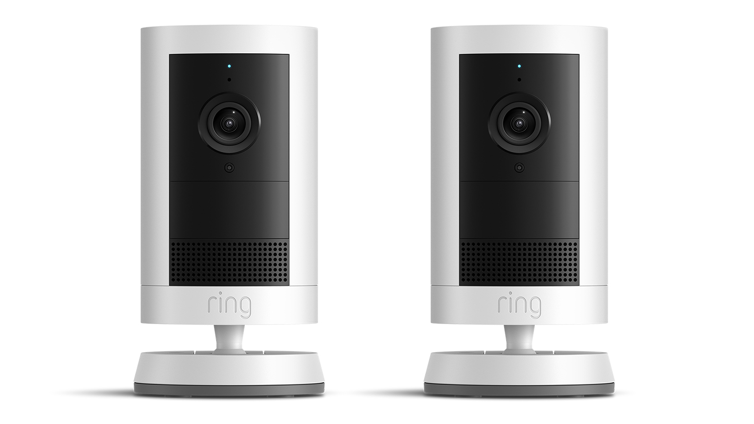 Two identical Ring Outdoor Camera Plus 2K units in white shown side-by-side