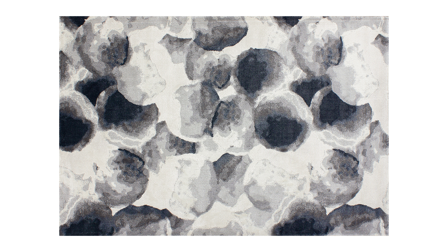 Overhead view of the Amberly Navy Rug featuring abstract falling petals design
