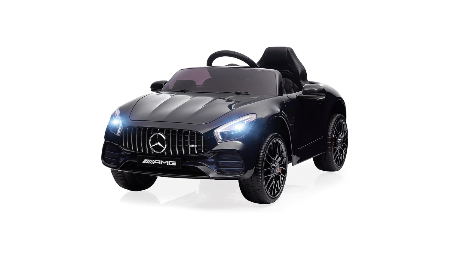 A black ride-on toy car modelled after a Mercedes-Benz AMG, with its headlights on