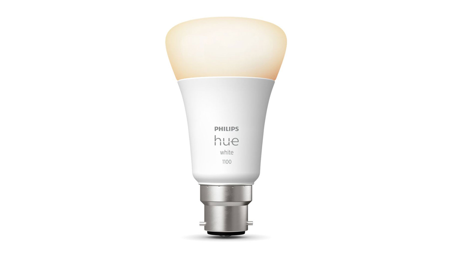 Philips Hue B22 A60 9.5W Smart Light Bulb emitting a warm yellow-tinted light