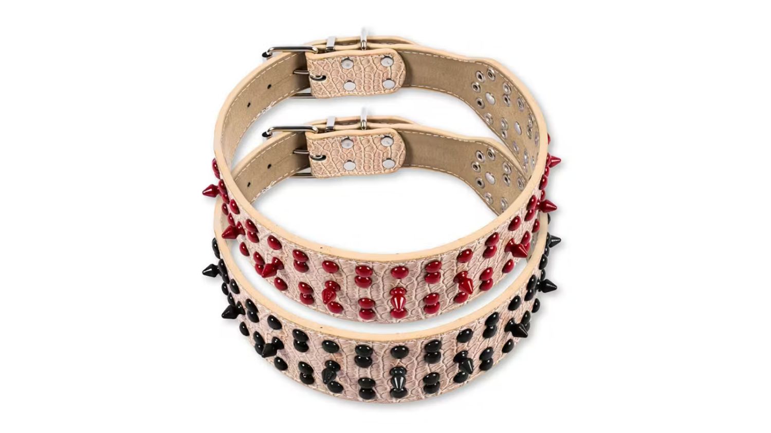 Two beige leather dog collars with rows of red and black spikes were displayed side by side
