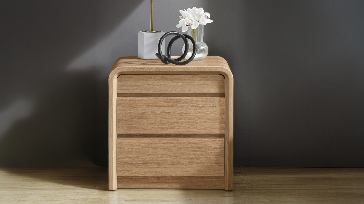 A front view of the Arc 3 Drawer Bedside Table