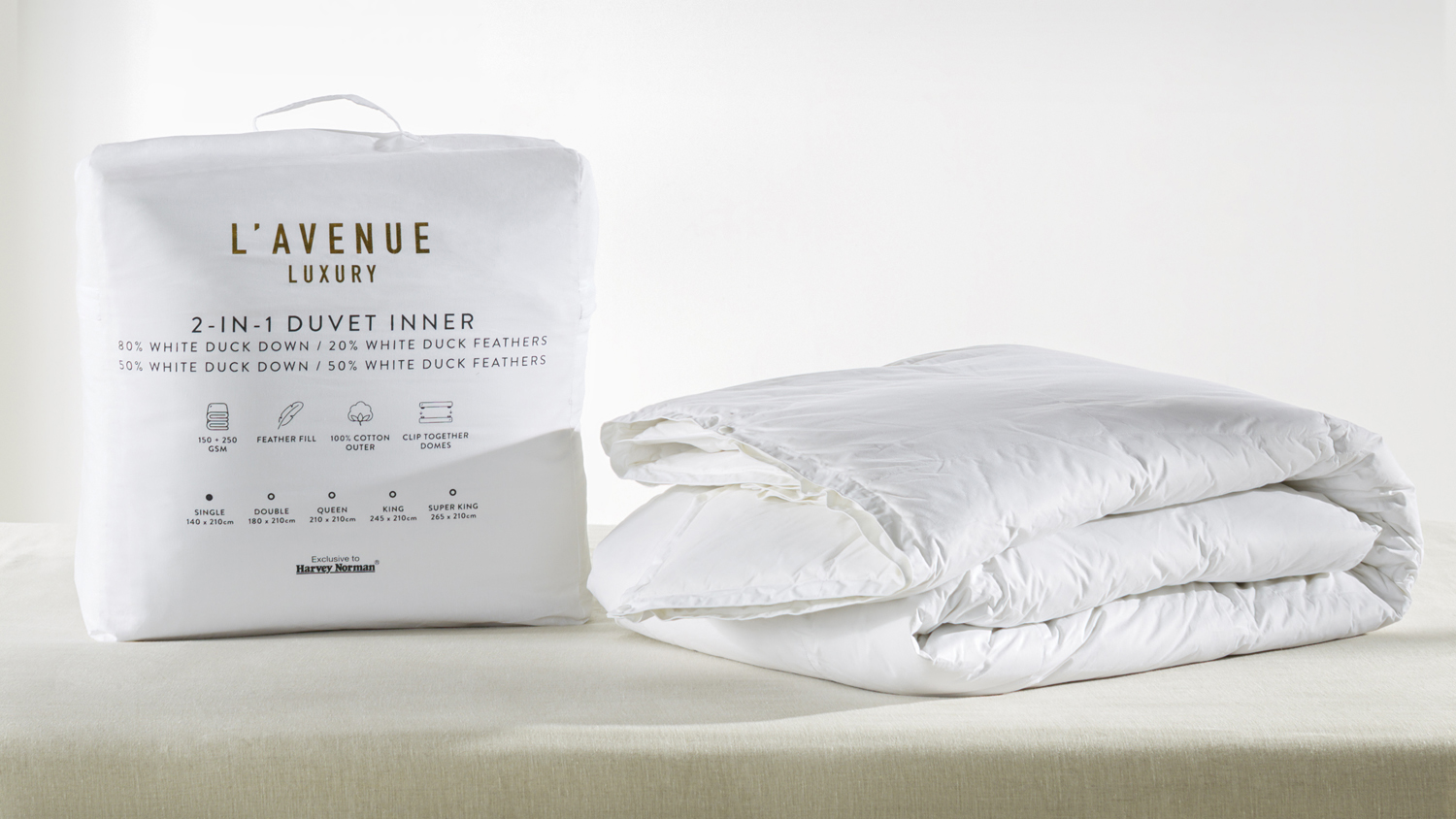 Packaged and folded L'Avenue 2-in-1 White Duck Down Duvet Inner with clip together domes