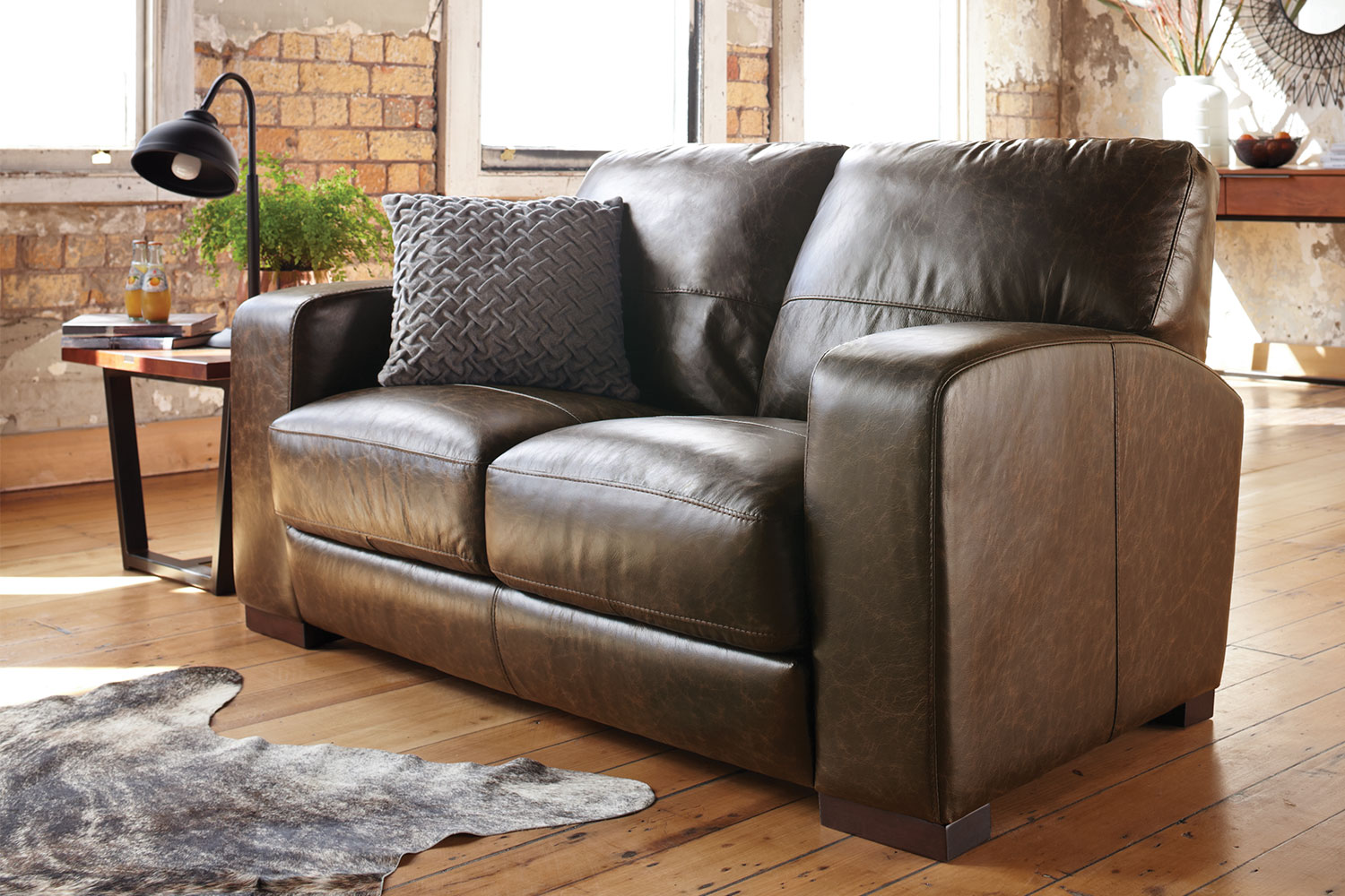 Two seater deals leather sofa