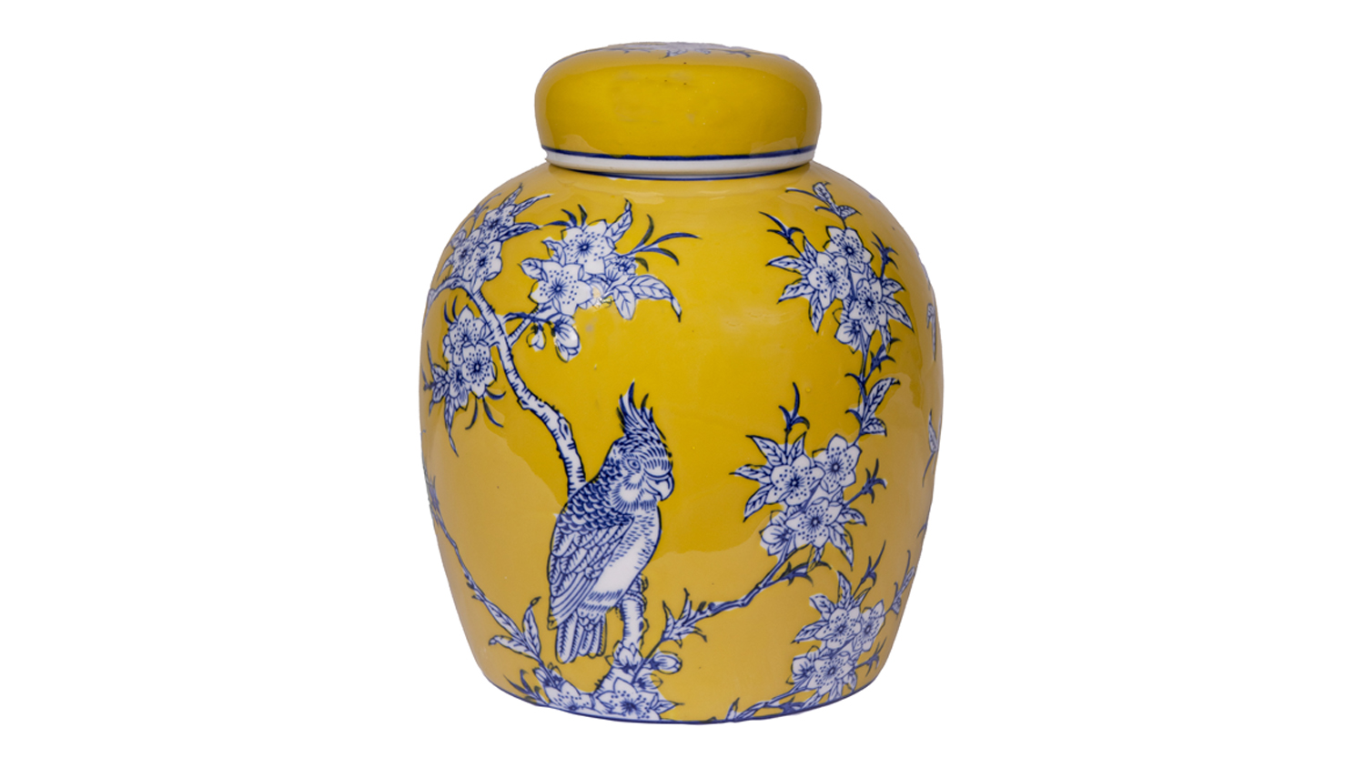 A rounded yellow ceramic jar with a fitted lid, decorated with blue flowering branches and a perched bird design