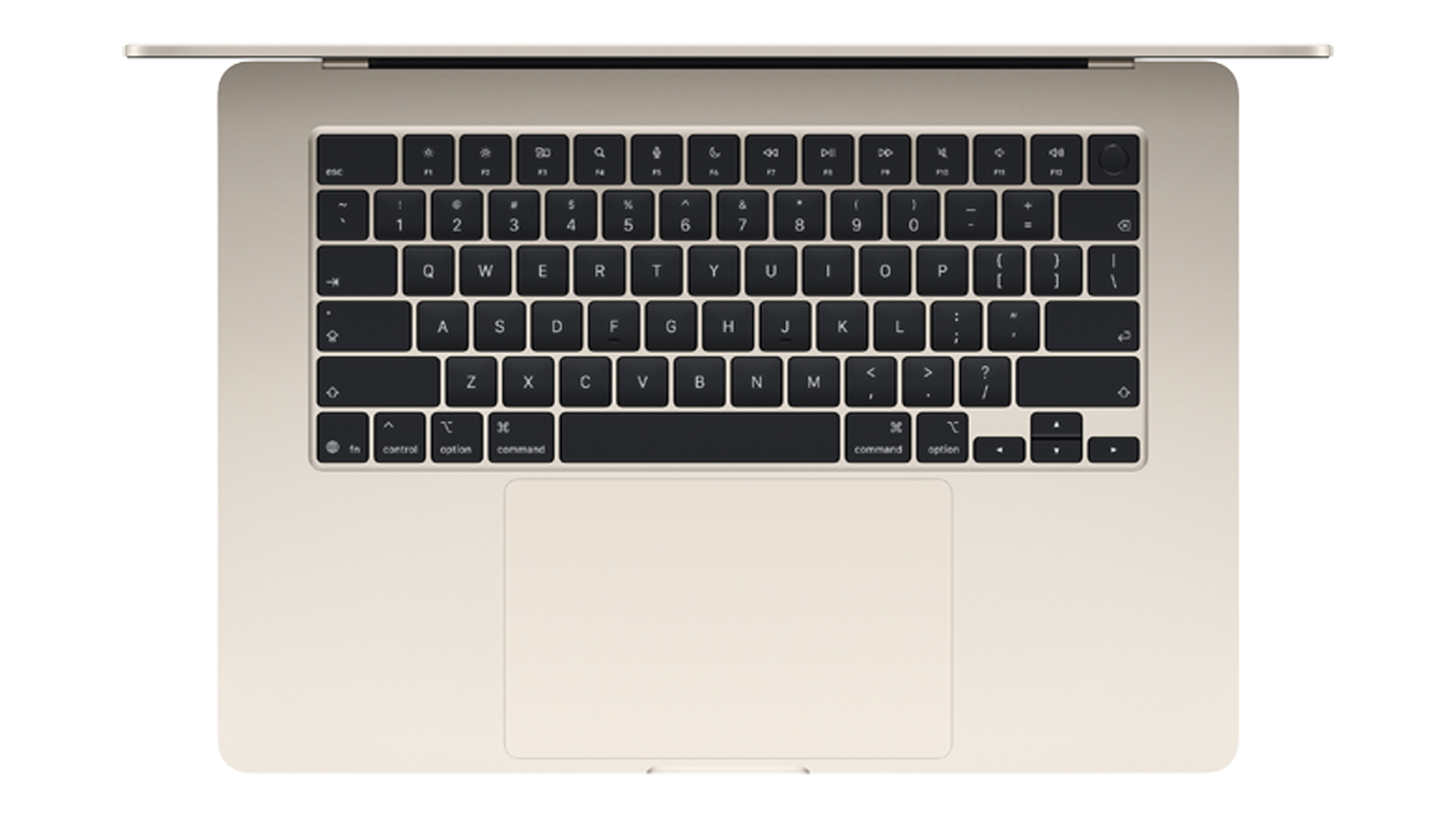 Top-down view of the starlight MacBook Air keyboard and large trackpad, showing the full key layout