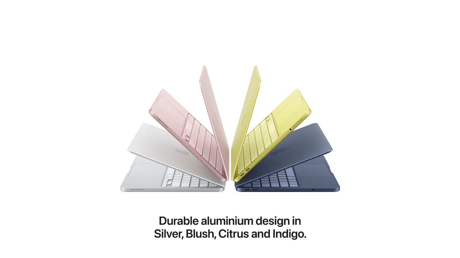 A lineup of the new MacBook Neo showing its thin profile in four distinct colours—Silver, Brush, Citrus, and Indigo