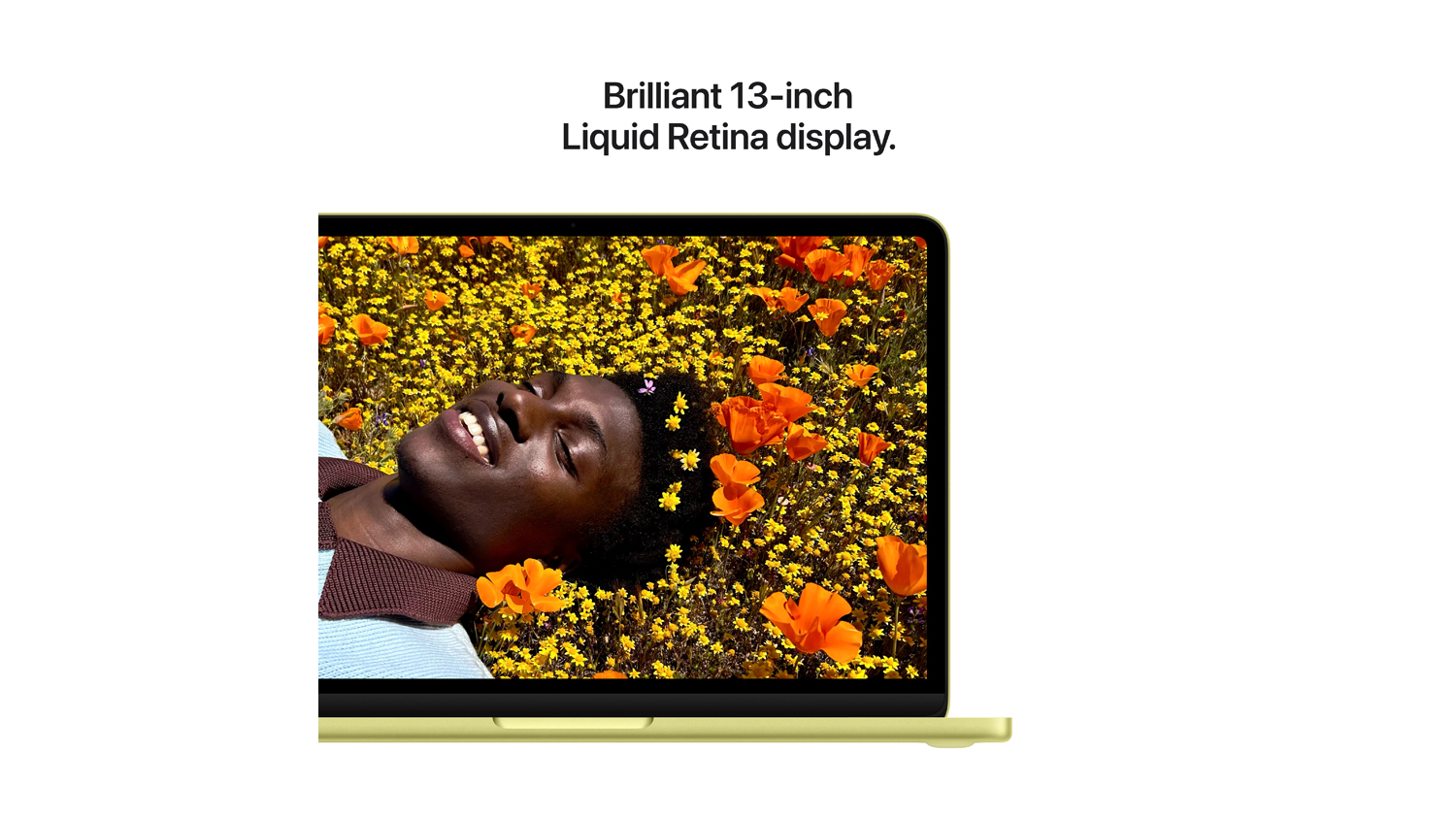 Close-up of the MacBook Neo 13-inch Liquid Retina display showing a vibrant, high-detail floral image