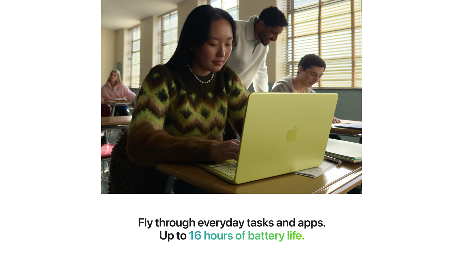 A student using the MacBook Neo in a classroom, highlighting its 16-hour battery life