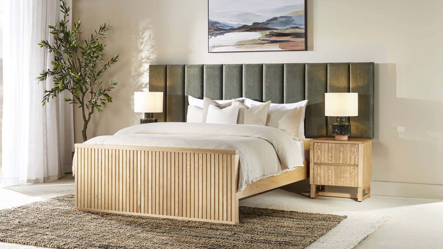 Modern bedroom interior featuring the Akaroa King Upholstered Extended Bed Frame and natural wood furniture