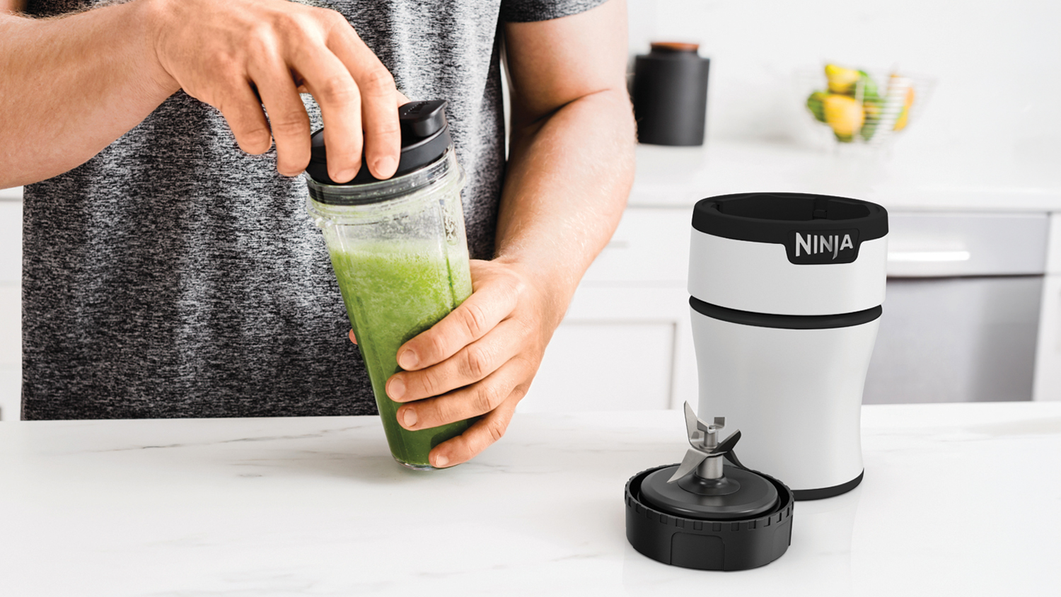 Ninja 900W Nutri-Blender Plus with fruit and ice in the jar