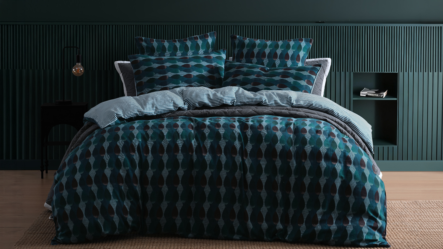 Hudson Teal Duvet Cover Set with a bold geometric design, shown in a styled bedroom