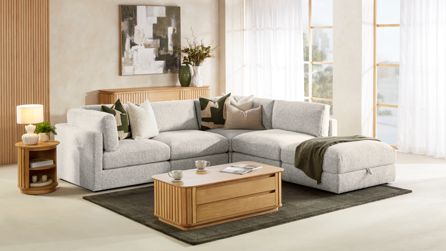 Modern Denver 4 Seater Corner Sofa with a spacious ottoman and plush fabric in Marshmallow colour