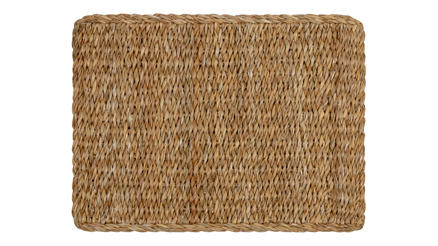 Top-down view of a rectangular hand-woven seagrass placemat with a thick braided border
