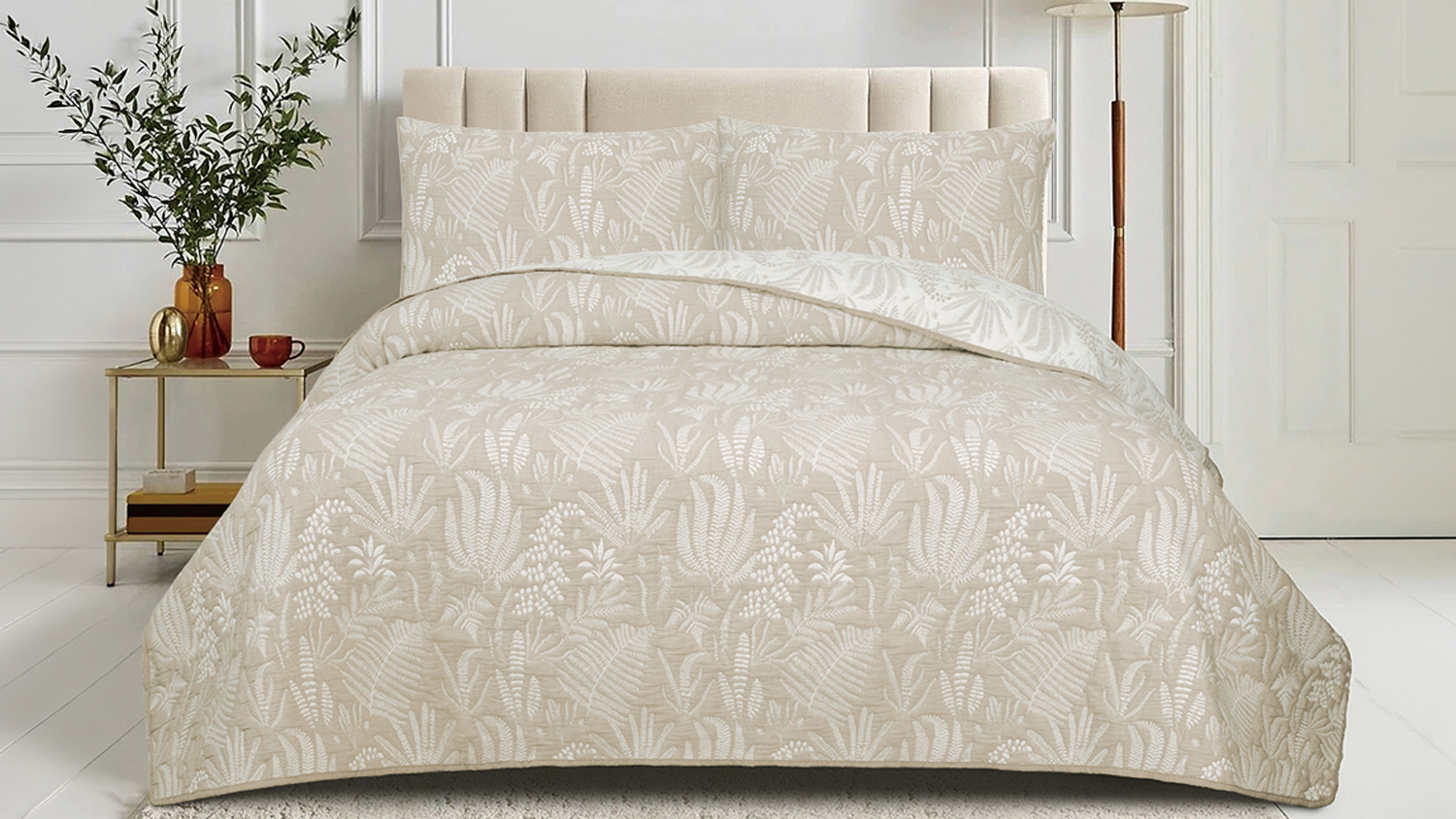 Wide bedroom scene showing the Botanical Bay Natural Coverlet Set on a neatly made bed
