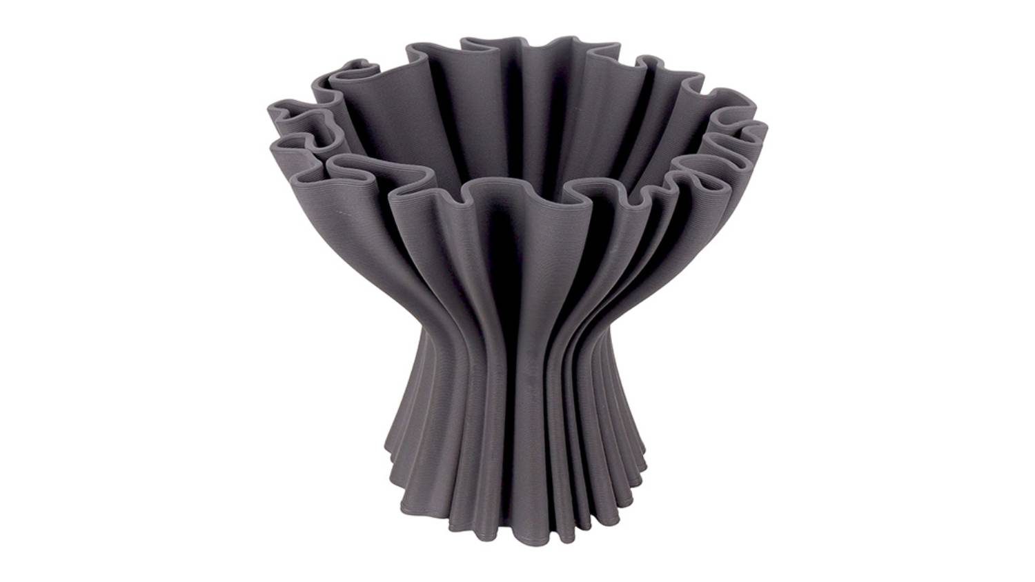A dark grey compote-style vase with a sculptural, ruffled design that flares widely at the top