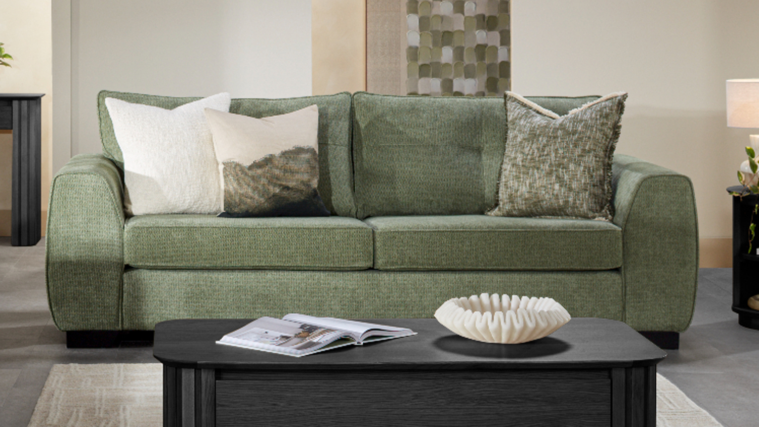 Botany 3 Seater Fabric Sofa upholstered in green fabric, shown front‑on in a styled living room