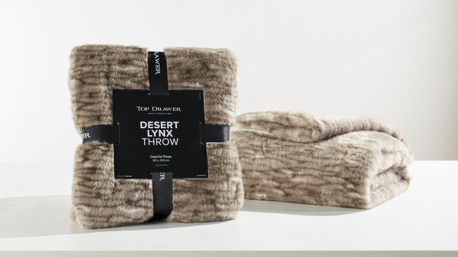 A Desert Lynx Beige/Brown Faux Fur Throw by Top Drawer