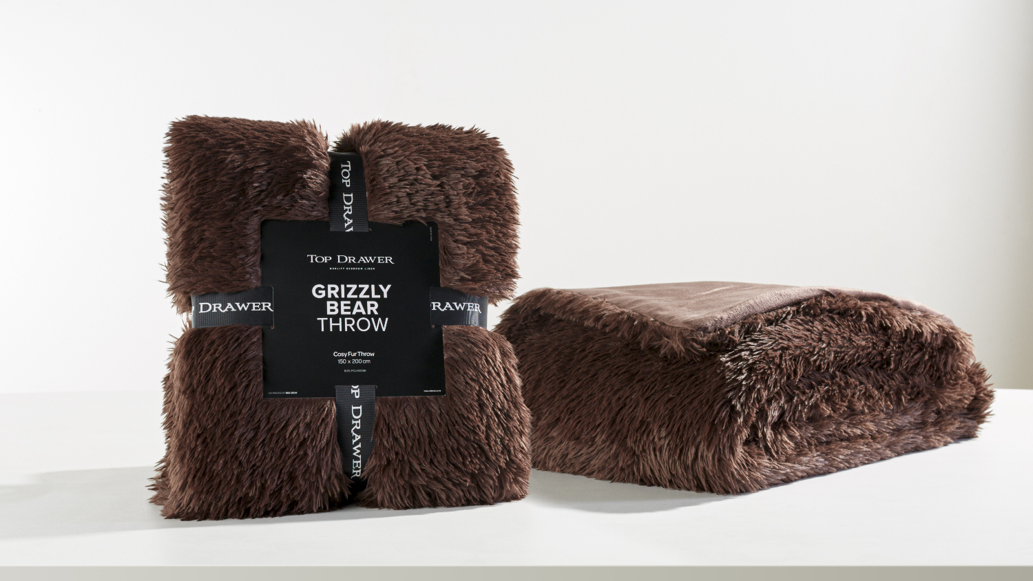 A Grizzly Bear Dark Brown Faux Fur Throw by Top Drawer
