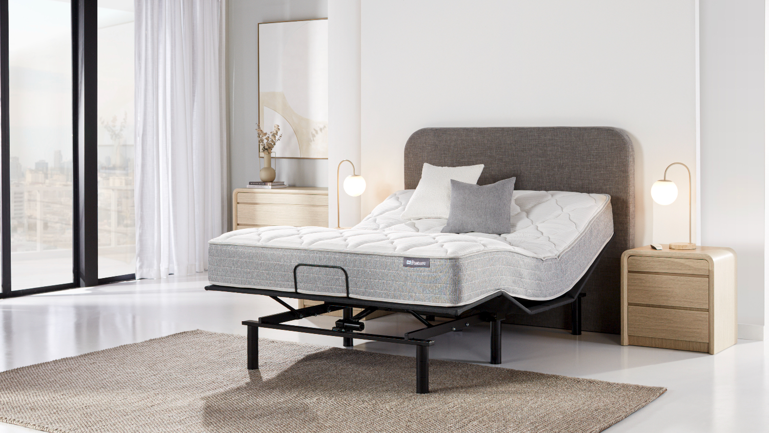 Side view of the adjustable base raised at both the head and foot sections