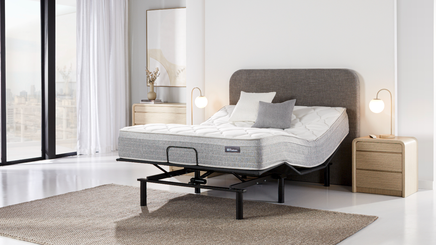 Side view of the adjustable base raised at both the head and foot sections