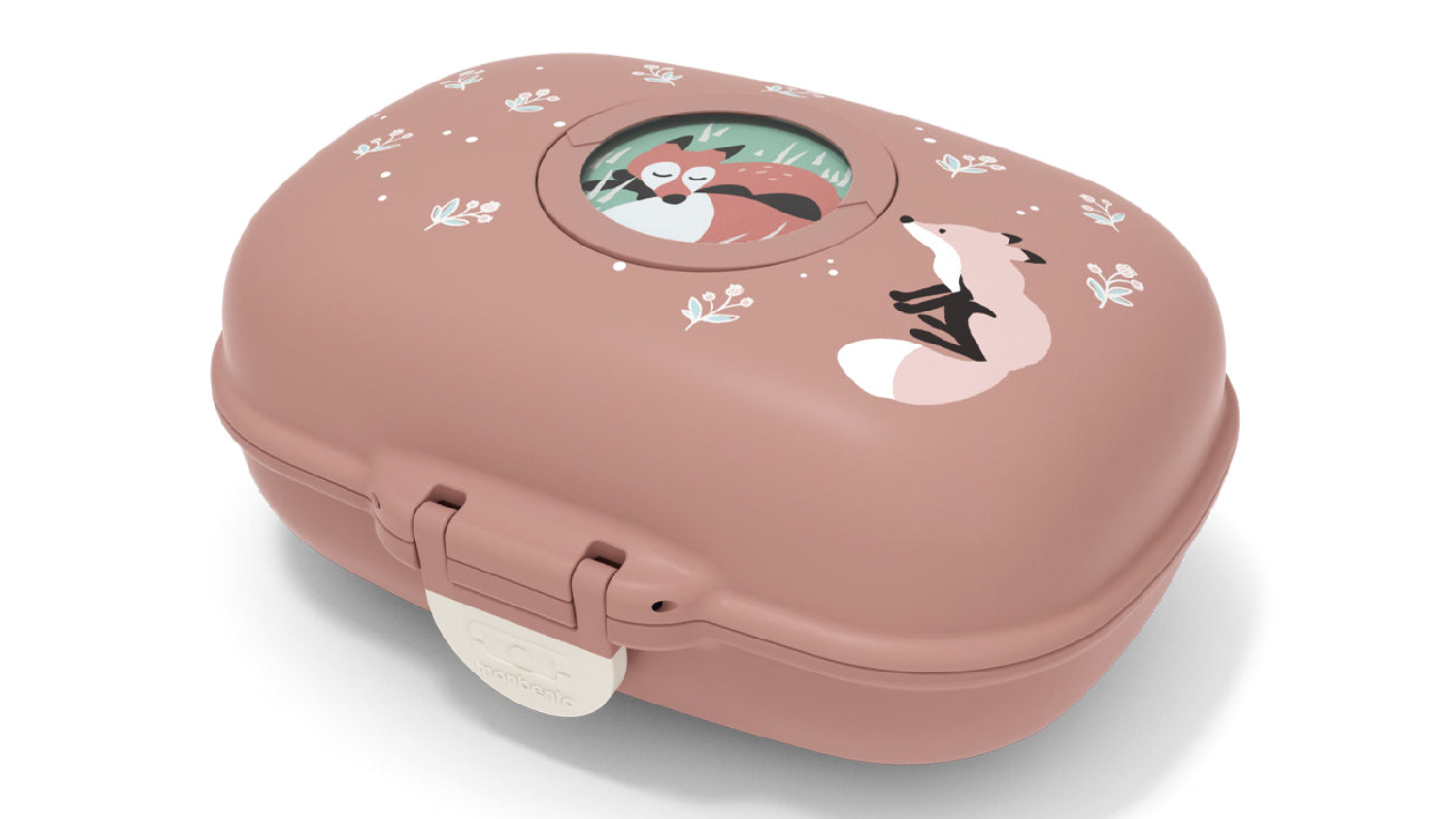 Cinnamon fox Monbento Gram children’s snack box with fox illustrations, rounded corners, a front latch, and a circular window on the lid